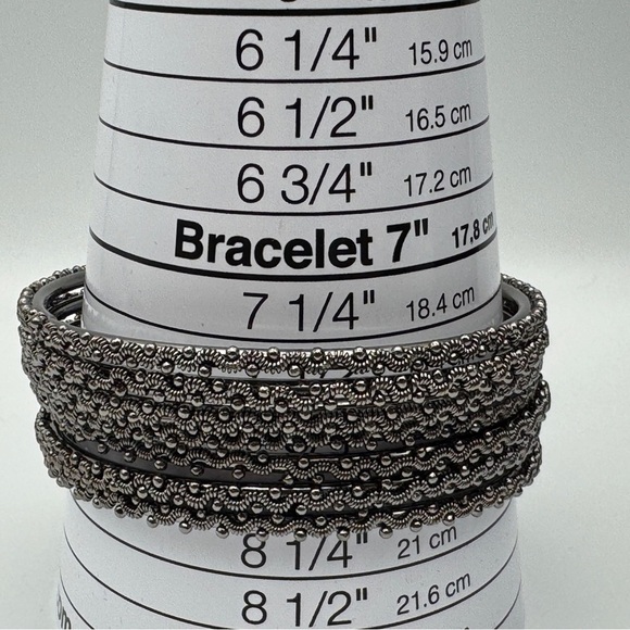 Set of 7 Silver Textured Bangle Bracelets 8.25” - Picture 2 of 4
